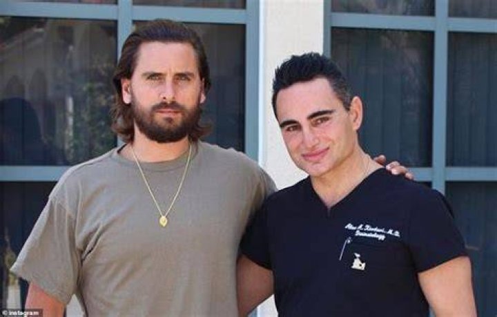 Khadavi - who has treated stars including Scott Disick, David Hasselhoff and Lance Bass - was recorded on surveillance video threatening the man in the lobby.