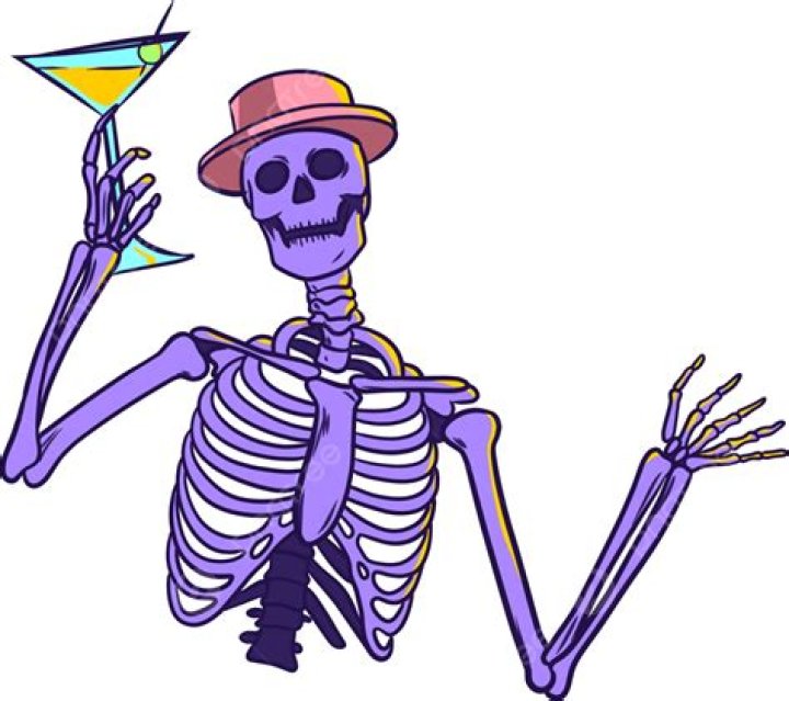 Seacrest posed with a drink inside
